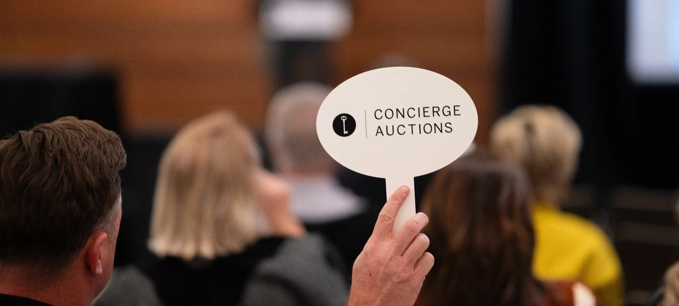 Hero image for Day one saw real estate sell live for the first time on RM Sotheby's stage; Day two earns a new record for total number of bids placed on a single lot.