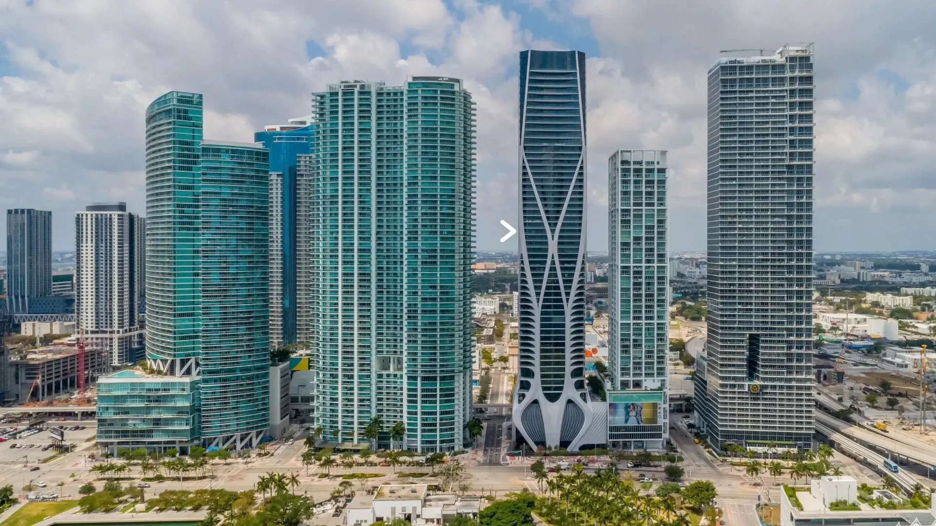 Luxurious, custom residence in Zaha Hadid-designed tower with premiere location near museums, music and entertainment.