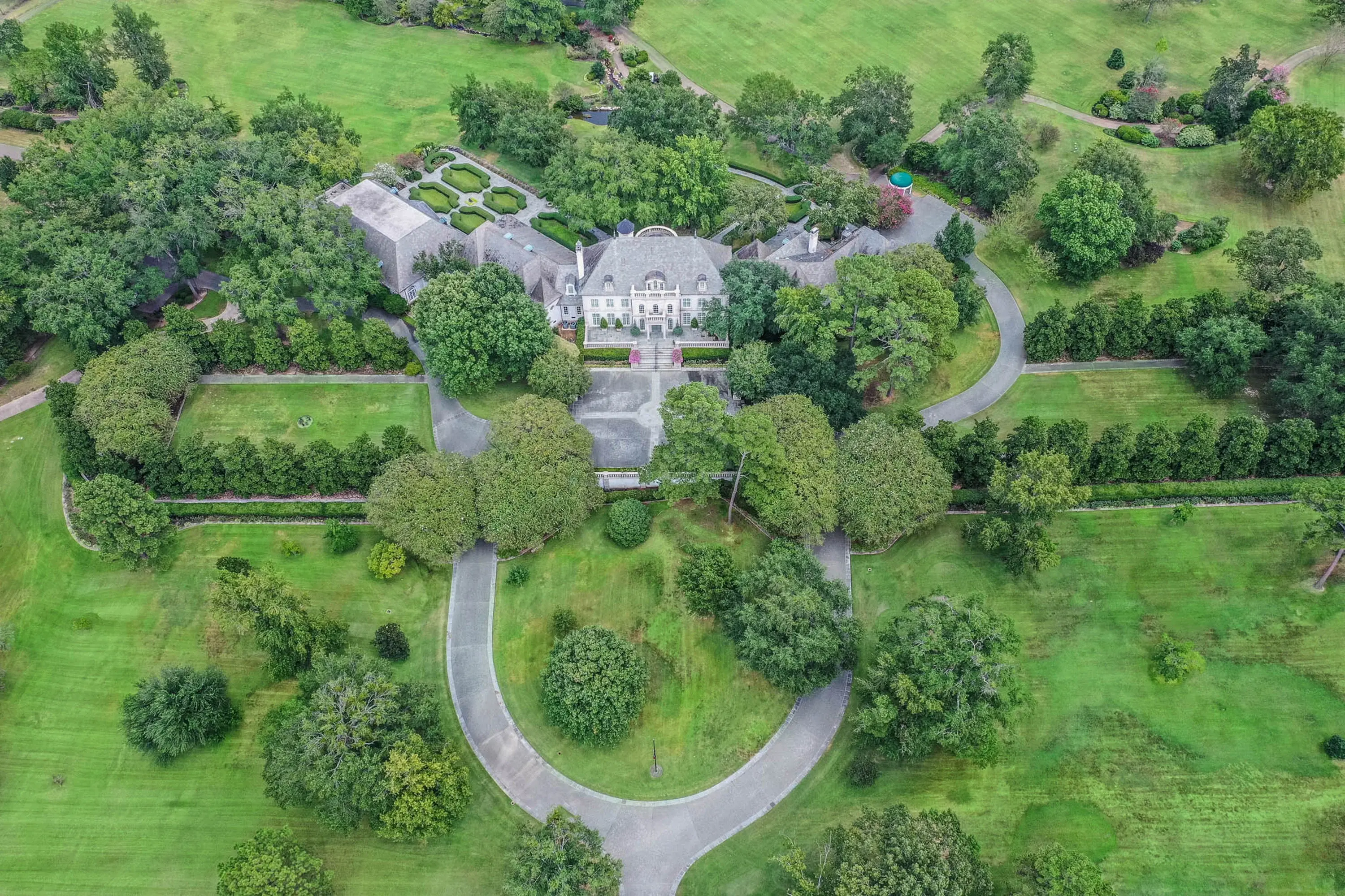 Hero image for Designed by architect Richard Drummond Davis, the estate was custom-built for Lonnie Alfred "Bo" Pilgrim, founder of Pilgrim's Pride.