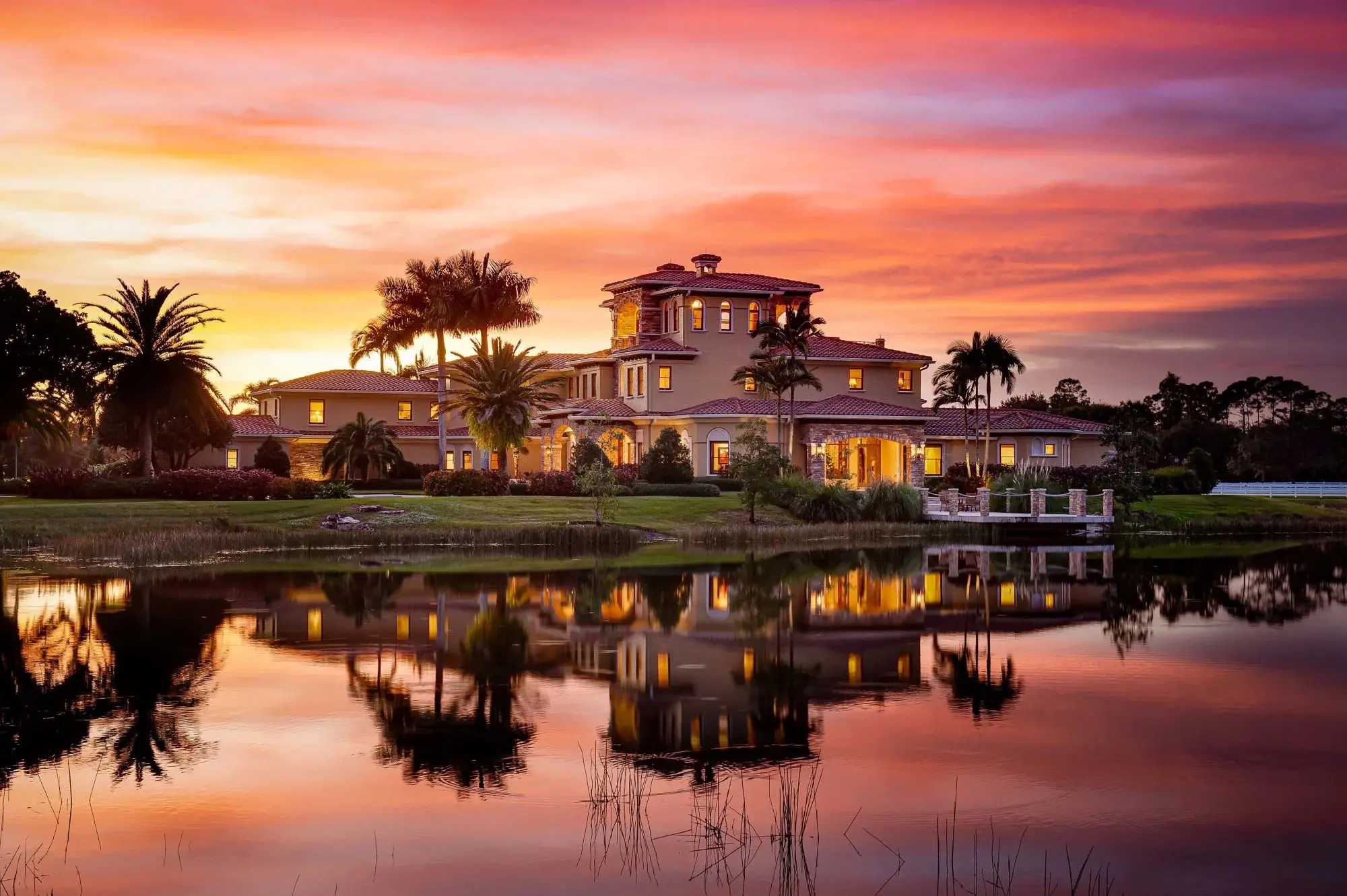 Reimagine luxury living with this impeccable 30-acre Mediterranean-style equestrian property boasting a heated salt-water pool and bass fishing lake.