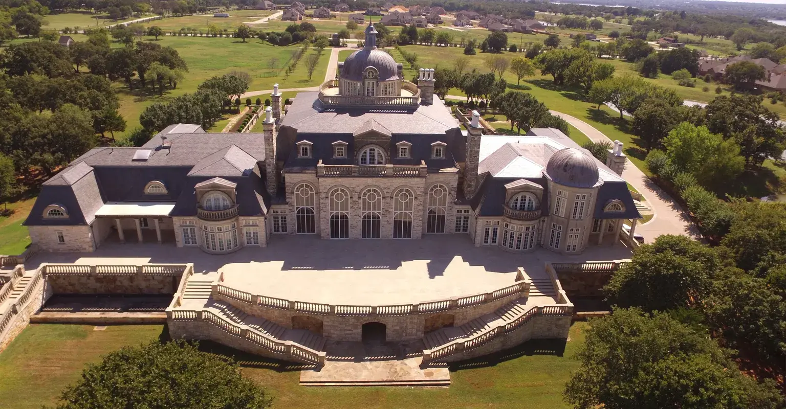 Hero image for It is one of the most written-about homes in Dallas, and everyone south of the Mason-Dixon has certainly heard about it. It is Champ D’Or, the 36,000 square foot mansion north