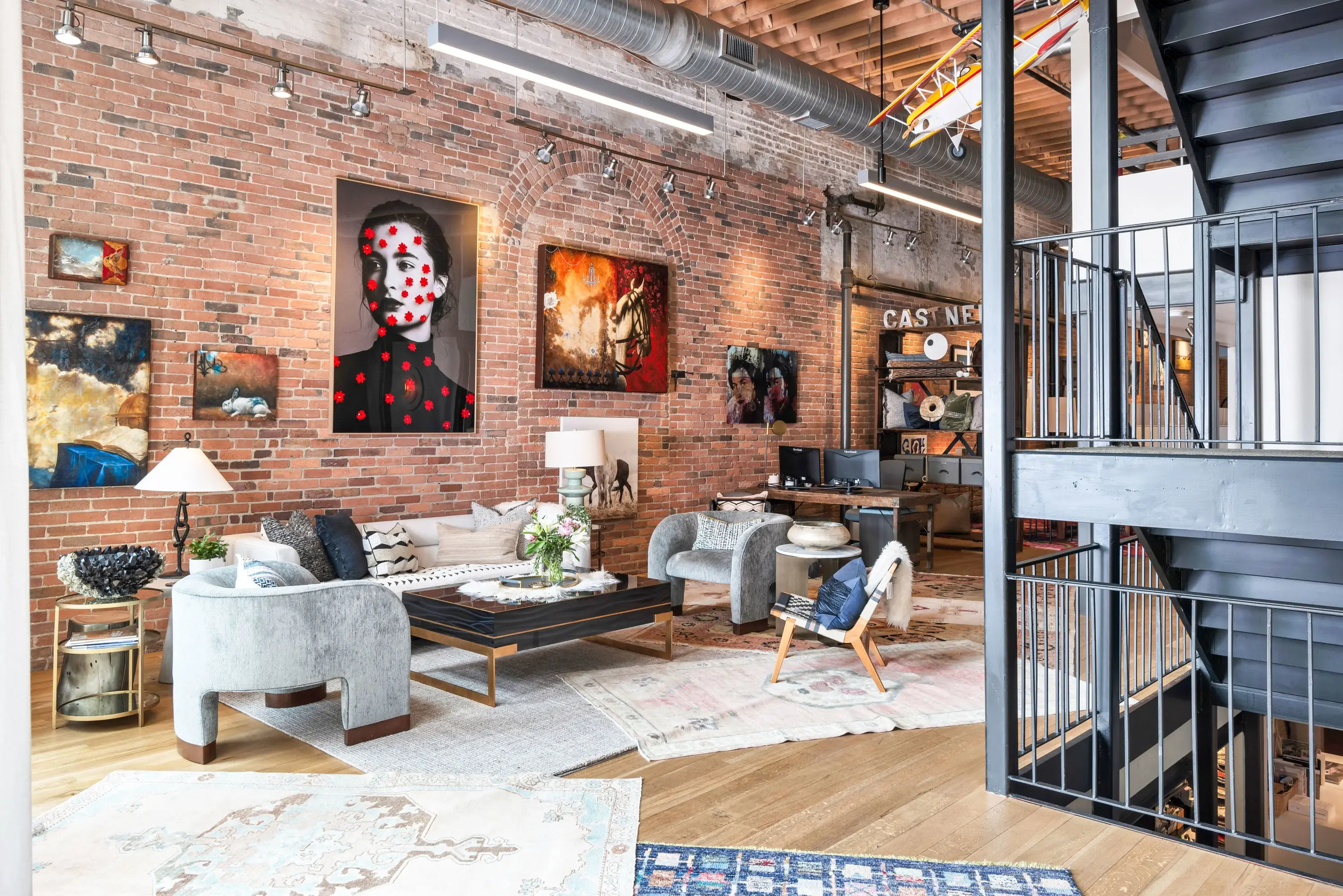 A rare architectural gem in the heart of Downtown Nashville, this extraordinary 1875 brick structure offers an unparalleled urban living experience that blends historic charm with contemporary design. 