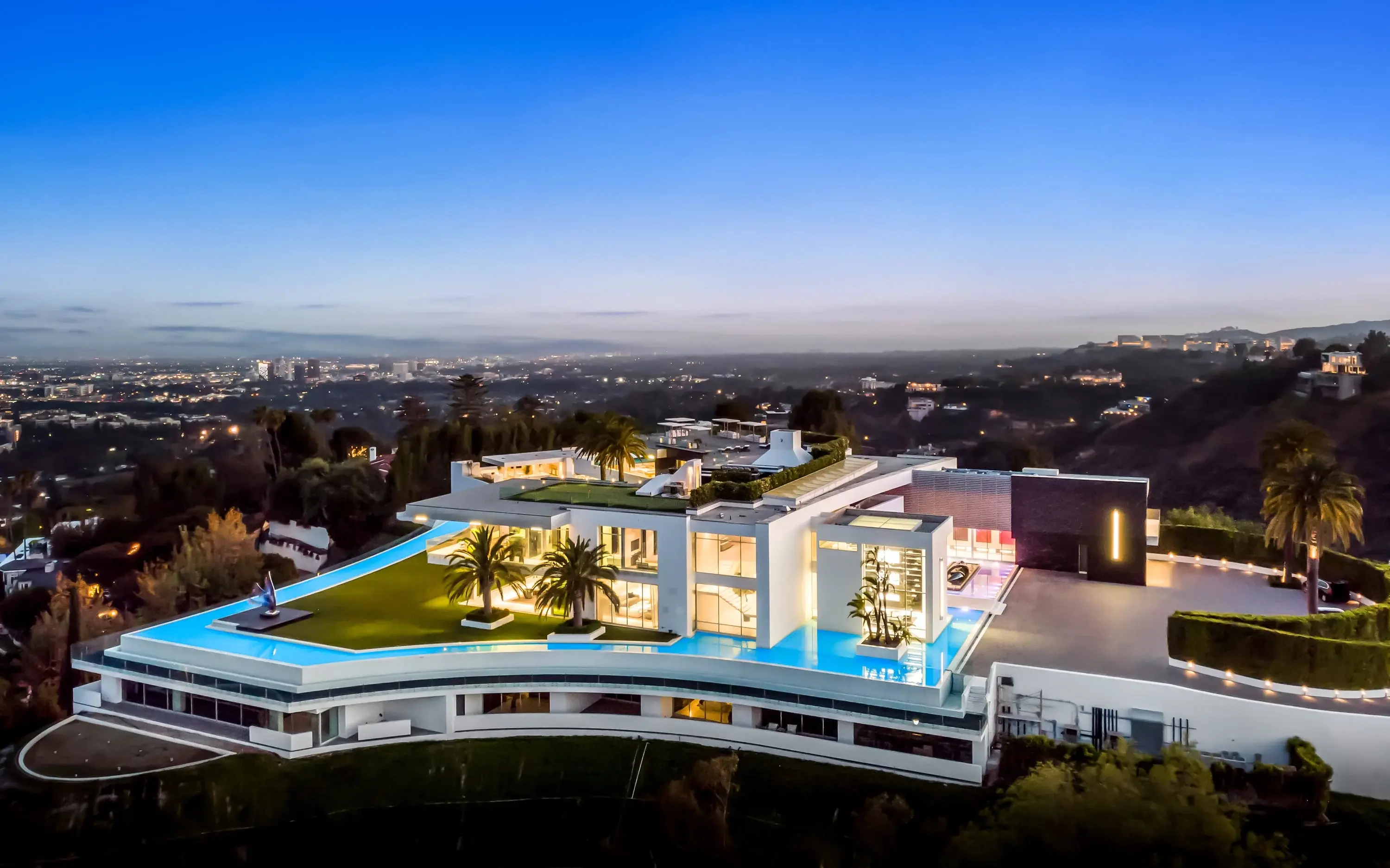 Hero image for Luxury Auction Firm Honored for World-Record Sale of ‘The One’ in Bel Air, California, America’s largest residence, sold at auction. 