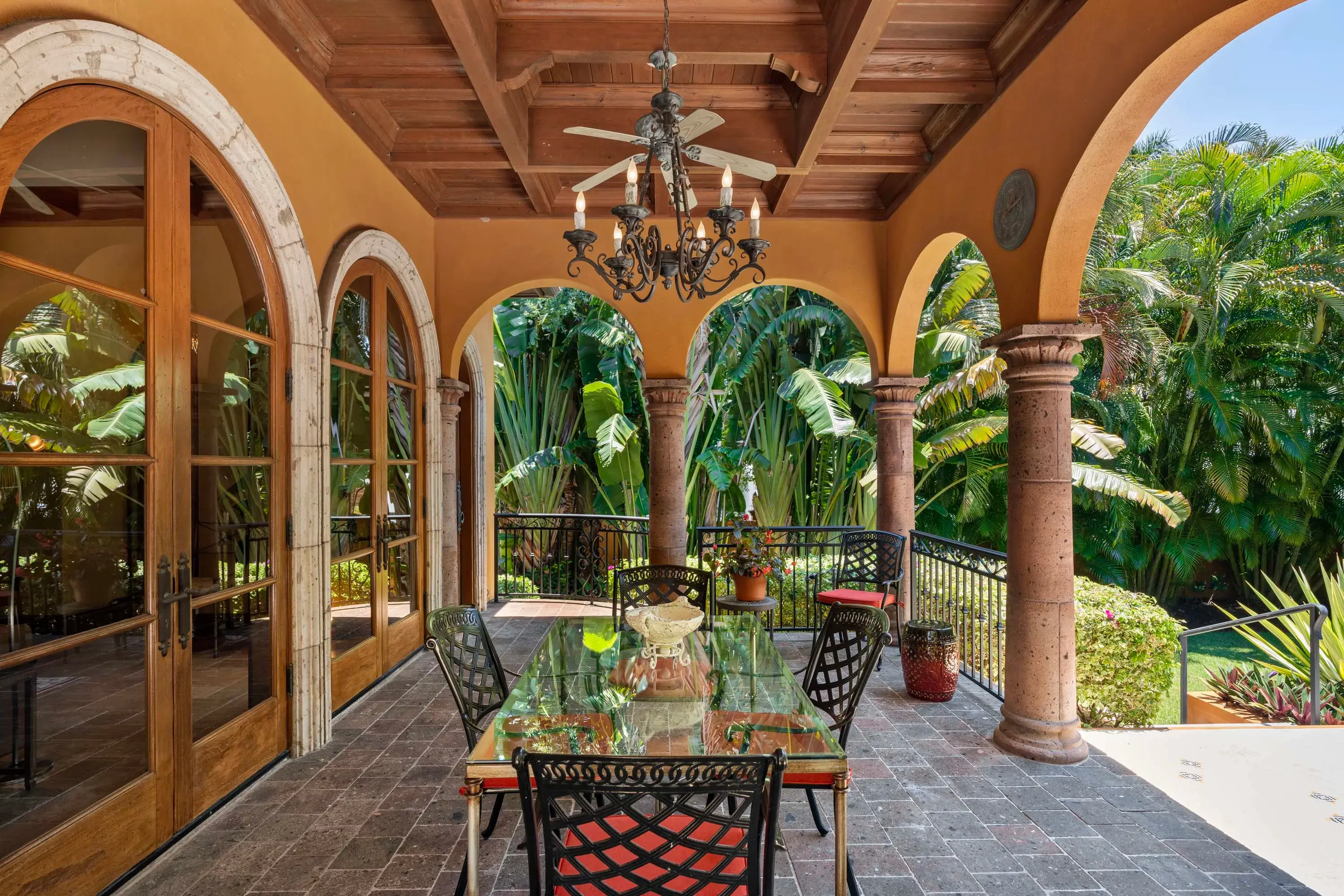 This gorgeous Mediterranean-style estate is just minutes from downtown Sarasota near Selby Gardens. This beautiful home has refined finishes and walled-in privacy and is located in the vibrant Avondale community. The property was designed by Kurt Lucas wi