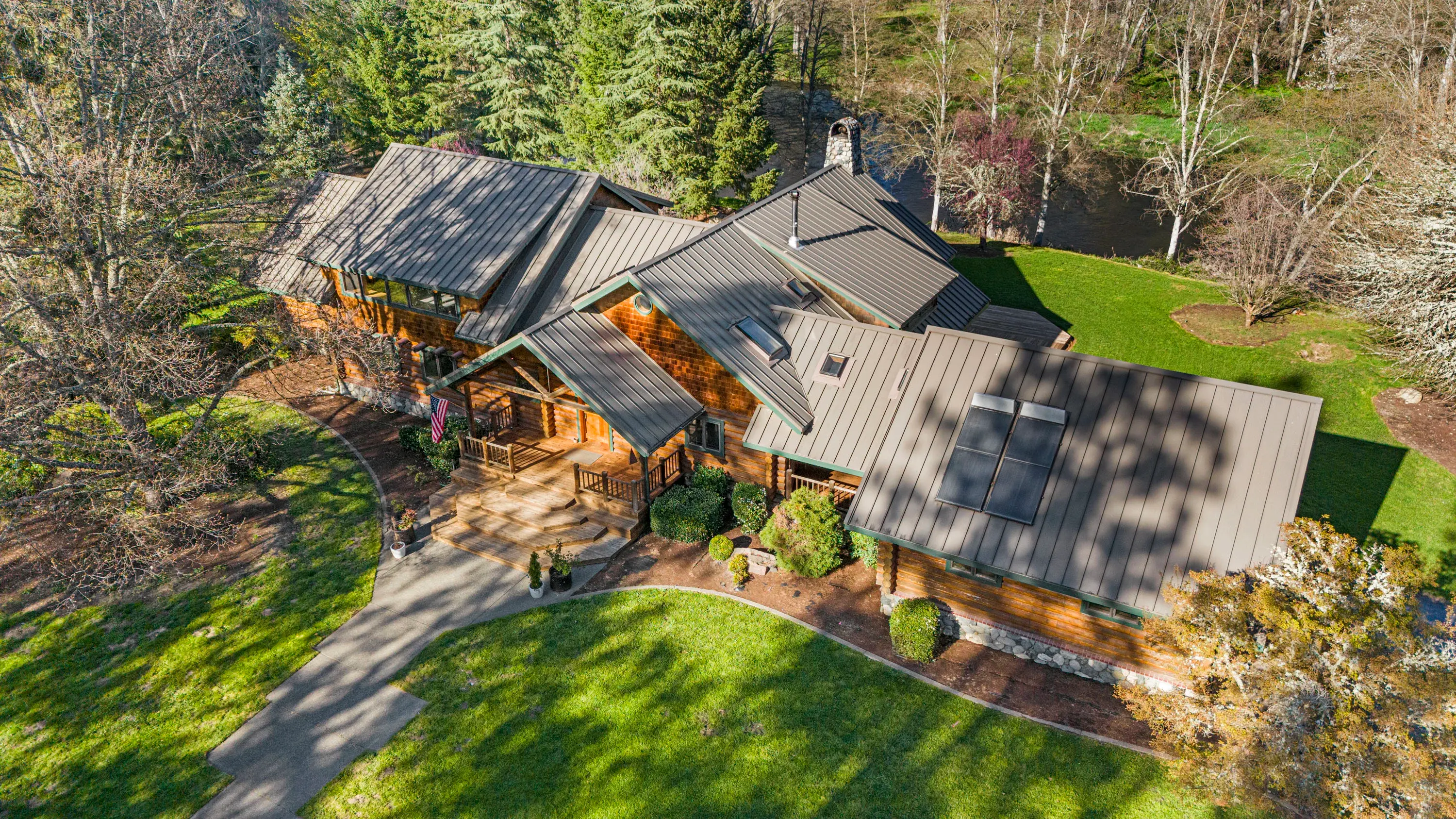 This gorgeous, custom-built log home on over 130 acres overlooks the Applegate River, one of the best rivers for fly fishing steelheads or trout. 