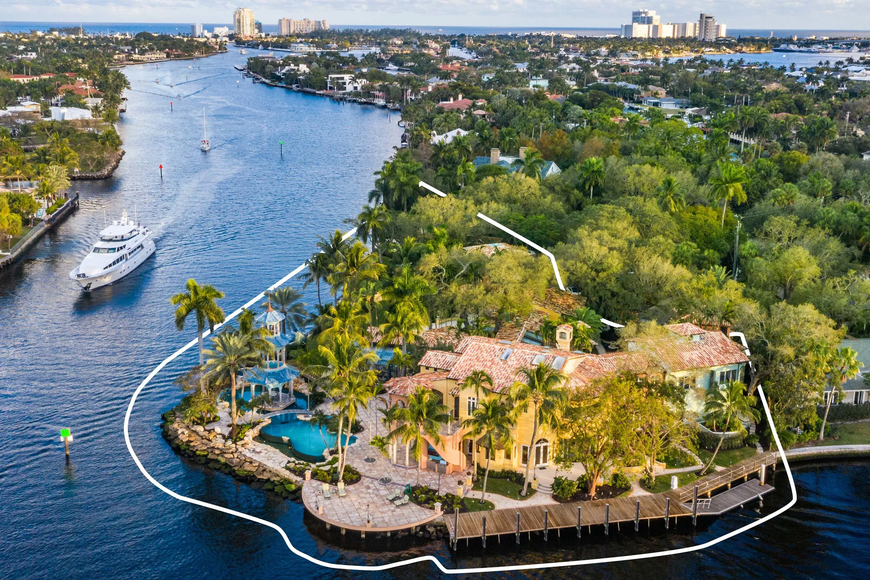 Hero image for Known as Tarpon Pointe, this exceptional waterfront estate completely embodies the South Florida lifestyle.