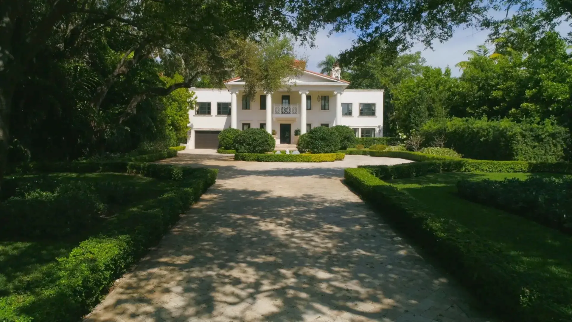Come home to South Florida splendor in the former home of John T. Peacock, one of the founders of Coconut Grove. With elegant finishes, voluminous ceilings, skylights, and walls of French doors giving you glimpses of the gorgeous gardens, your Mediterrane
