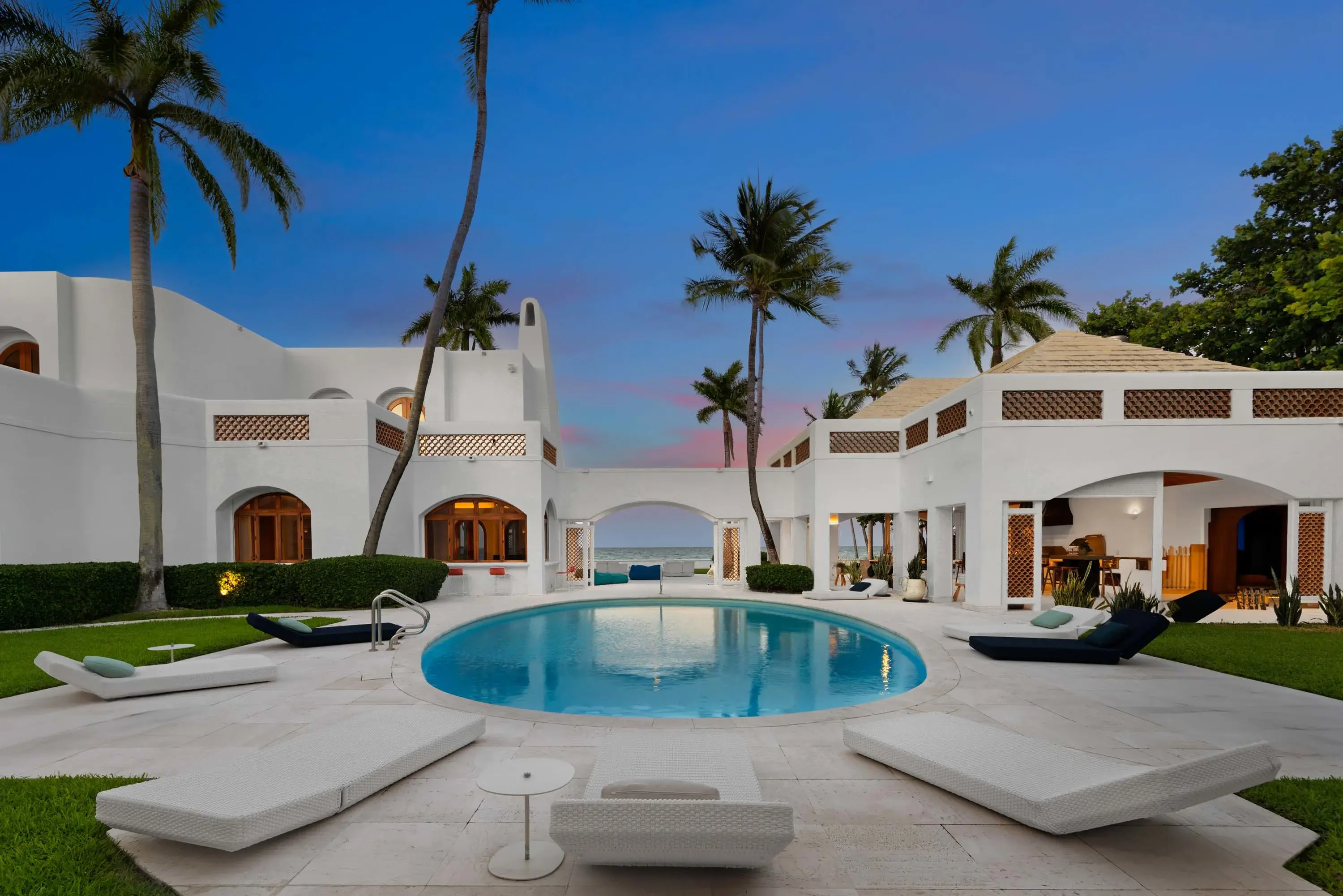 An extraordinary oceanfront legacy awaits at this magnificent 11,599-square-foot estate situated on nearly an acre of prime Golden Beach shoreline. This incomparable property captures South Florida's essence with dramatic Atlantic panoramas, 150 feet of p