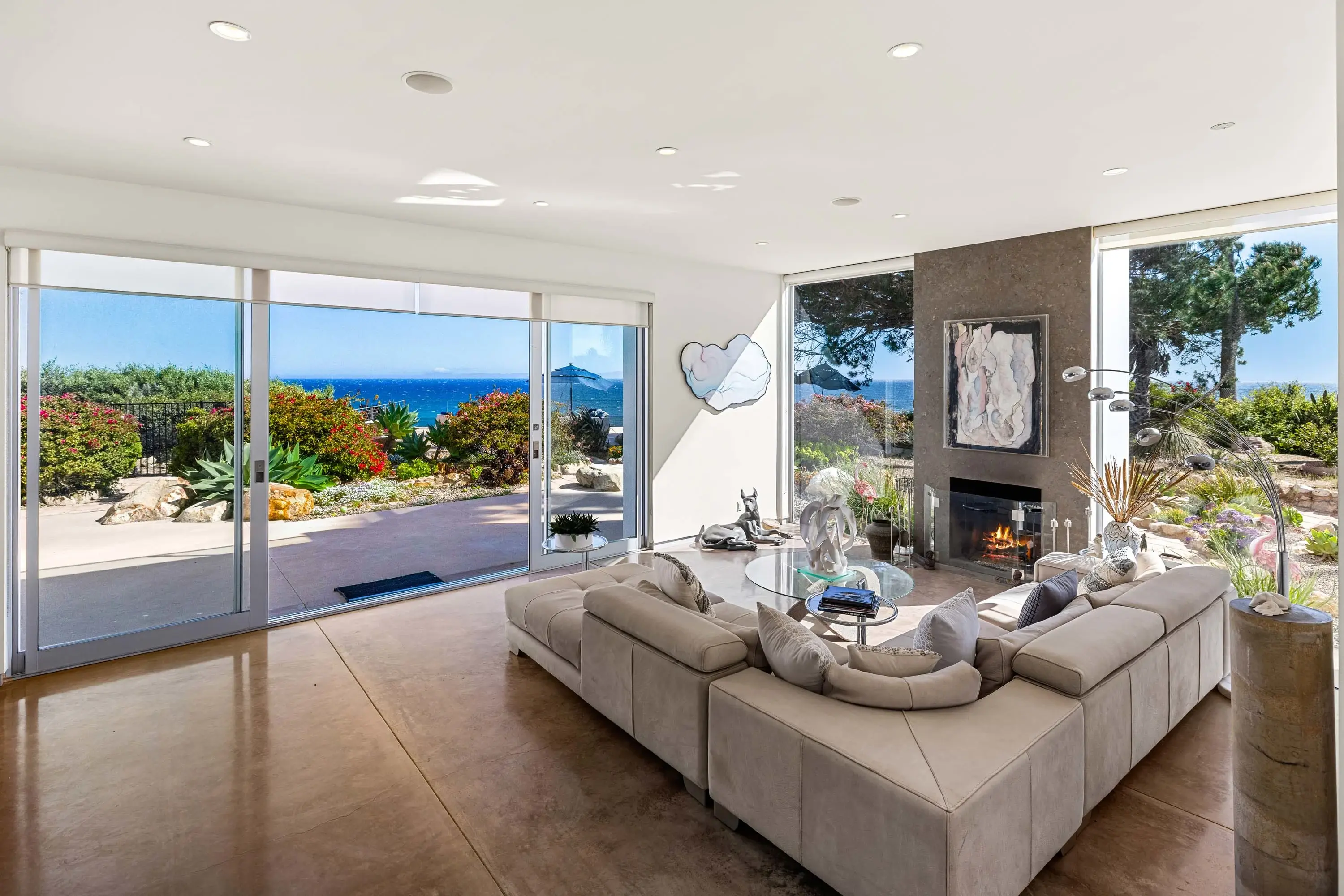 Nestled atop a stunning bluff in the exclusive More Mesa Shores community, Casa Blanca offers an unparalleled blend of luxury and artistry. This captivating estate, designed by Emmy Award-winning make-up artists Tom and Bari Burman, features striking whit