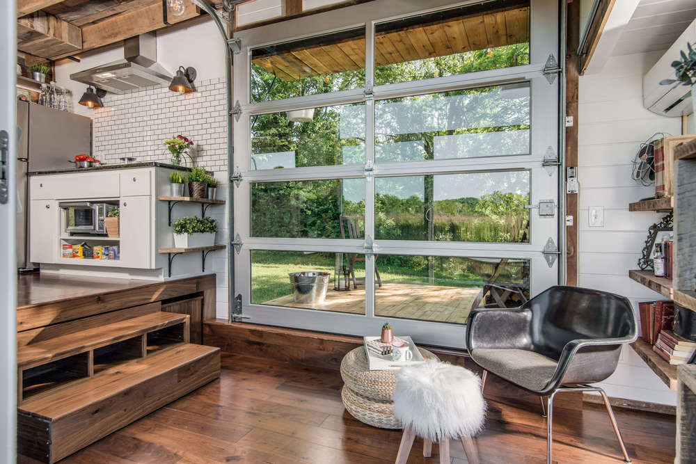 view-out-garage-door-closed-the-alpha-tiny-home-by-new-frontier-tiny-homes