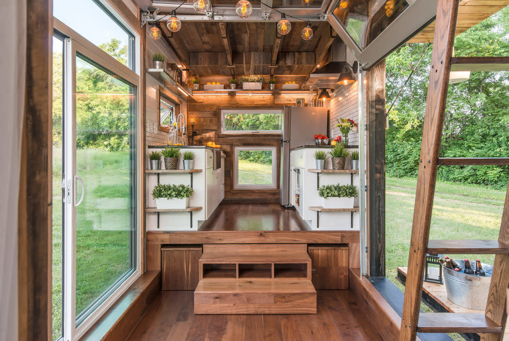 interior-view-toward-kitchen-the-alpha-tiny-home-by-new-frontier-tiny-homes