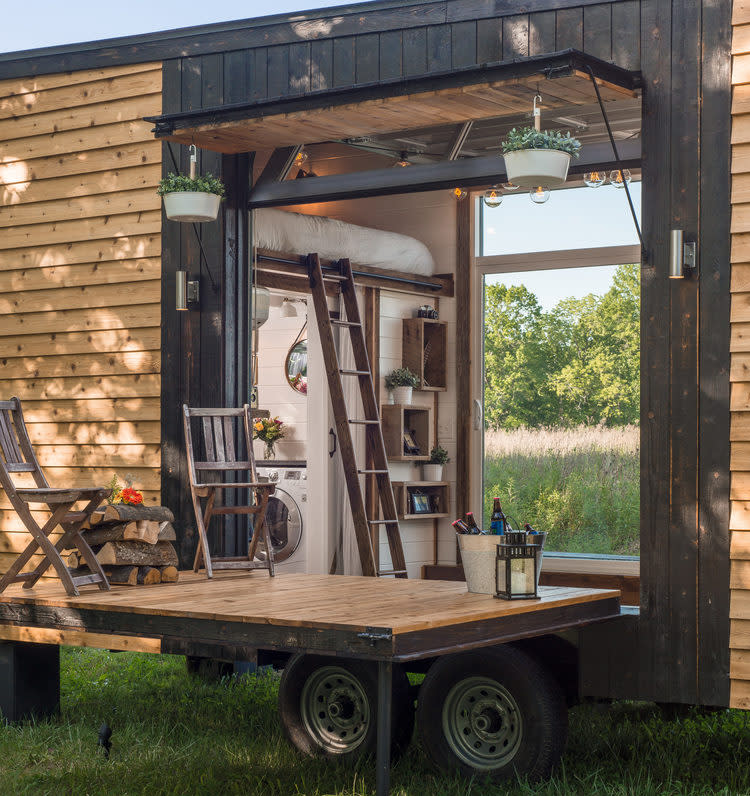 fold-down-deck-open-the-alpha-tiny-home-by-new-frontier-tiny-homes
