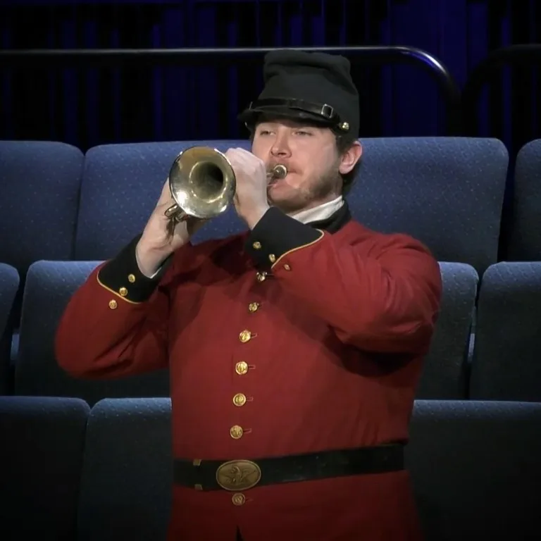 Robbie playing cornet with the saxon band