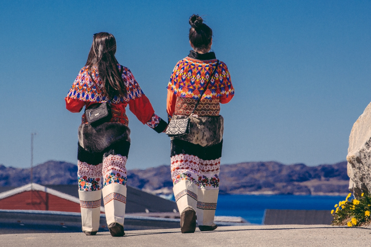 Inuit people dressed in traditional clothing in Greenland