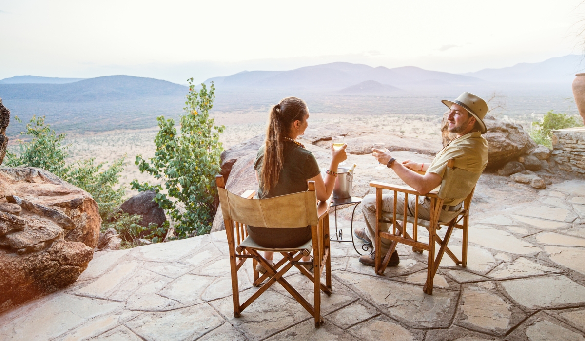 Couple on safari vacation in lodge in Africa