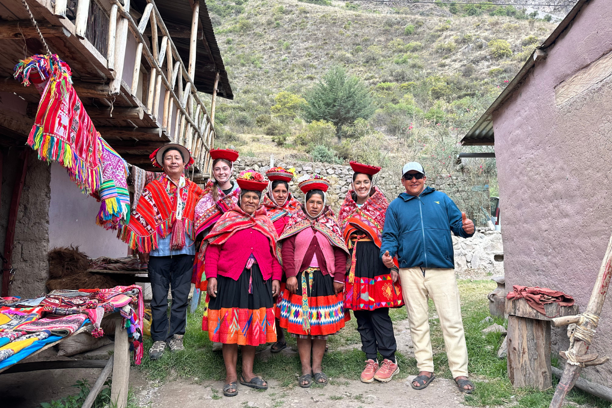 Learning, laughing, and weaving memories with our incredible hosts in the Sacred Valley. (Photo: Cam Kestner) 