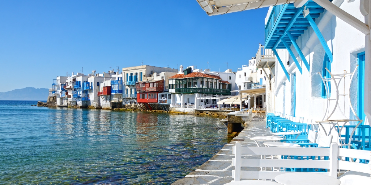 Seating area and buildings at bay of Mykonos, Greek island, Greece