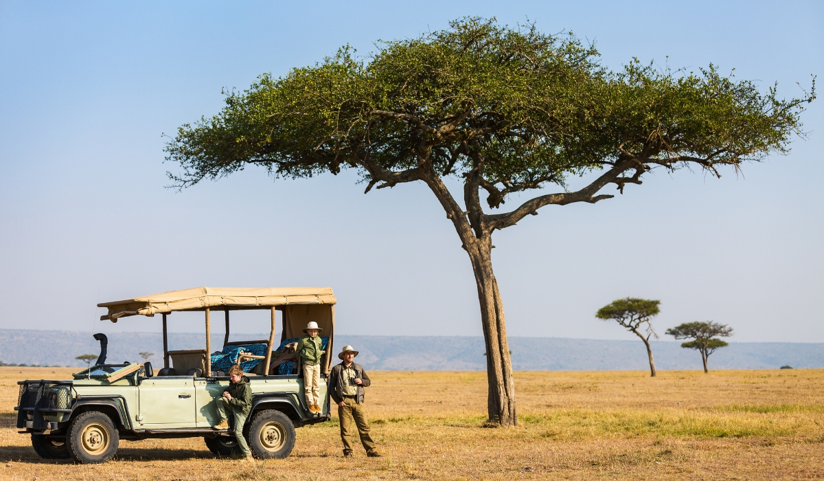 Family on game drive safari in Africa