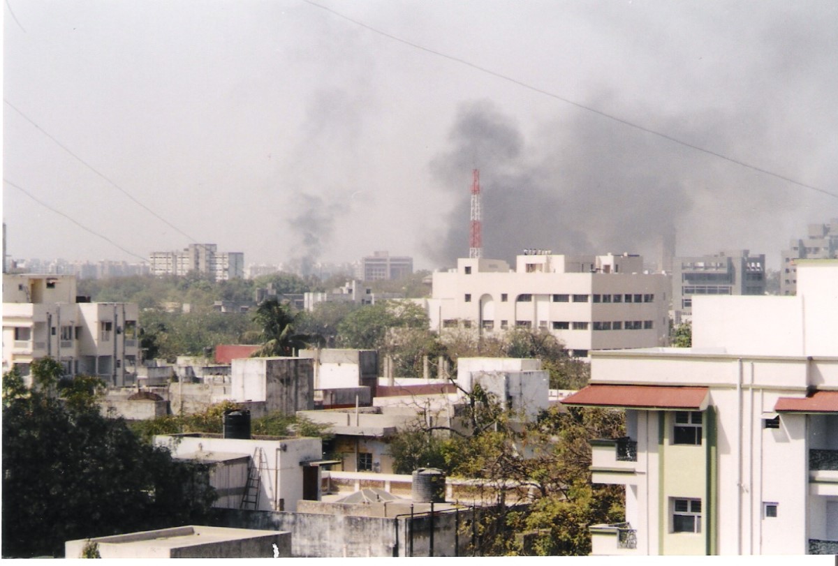 Buildings and shops set on fire during Gujarat riots in Ahmedabad, 2002