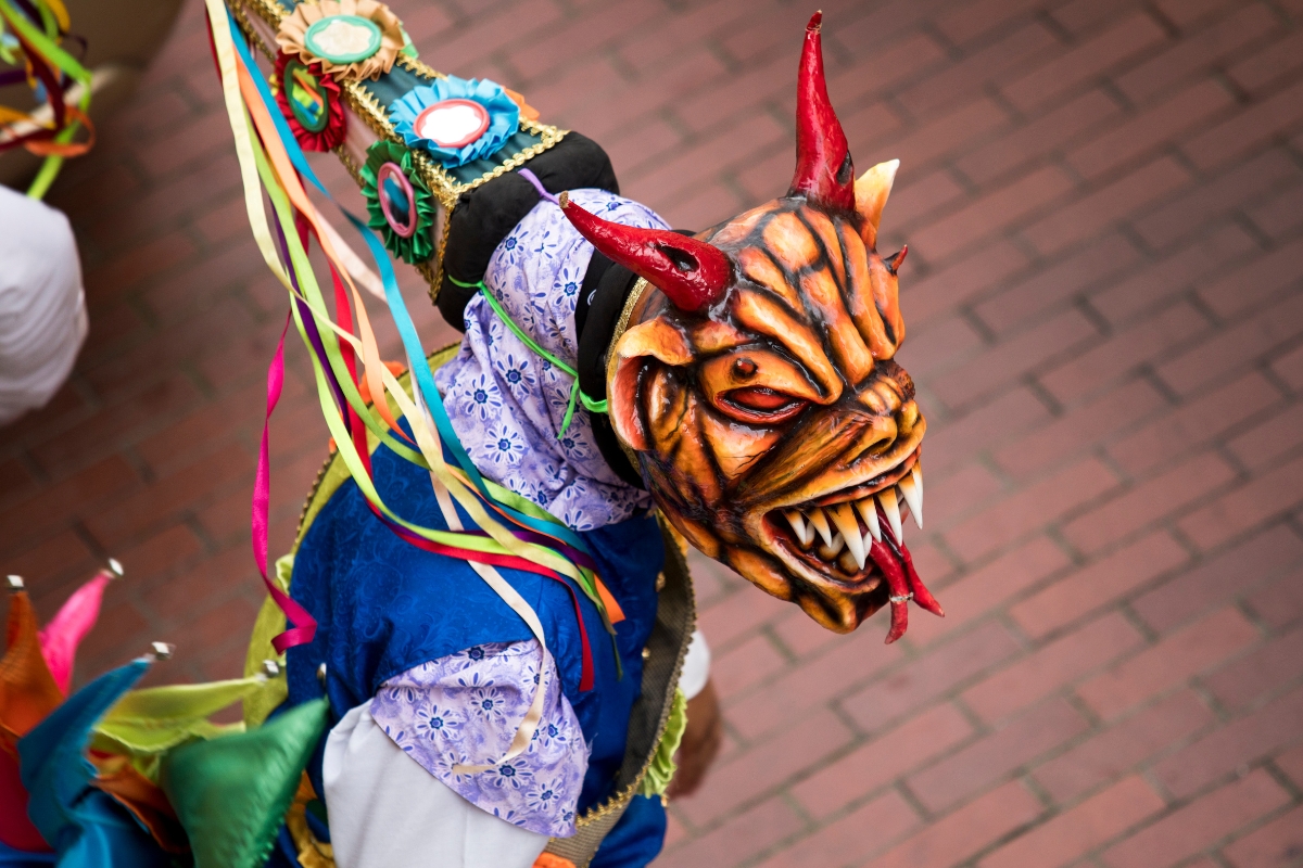 Diablicos performer with carnival masks in Panama festival