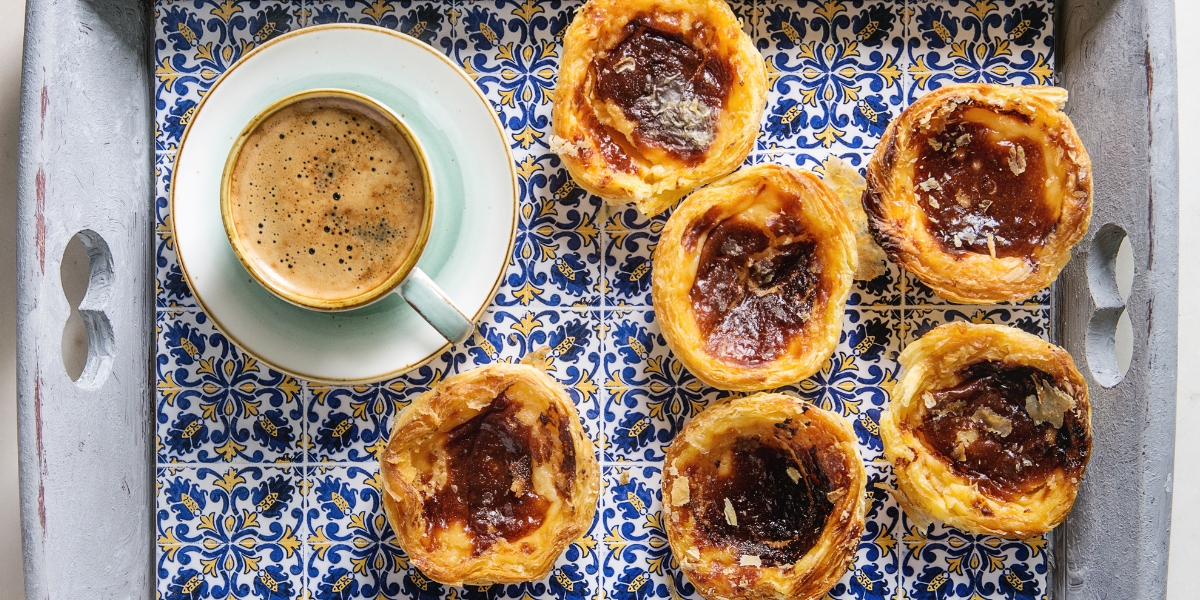 Portuguese tart dessert, pastéis de nata and coffee