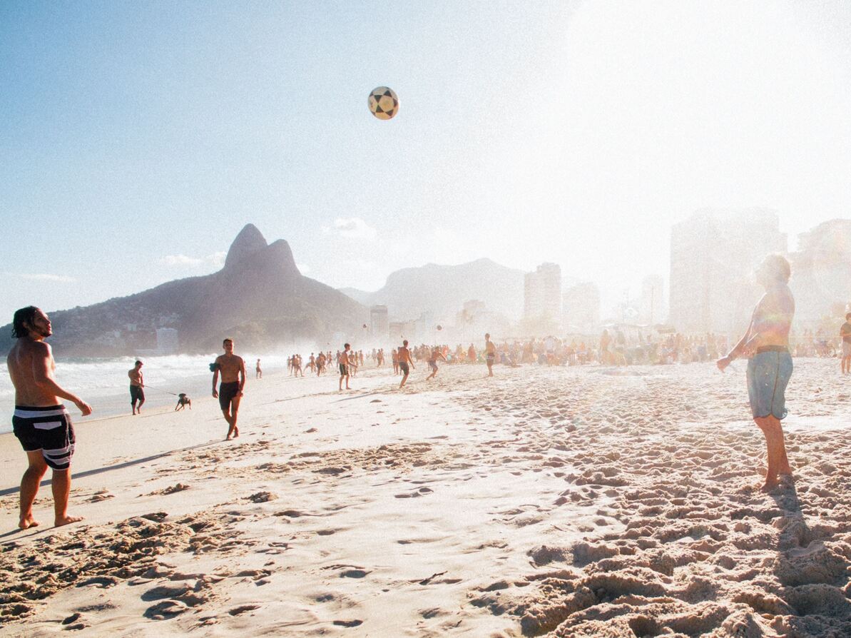 Playing volleyball in Ipanema