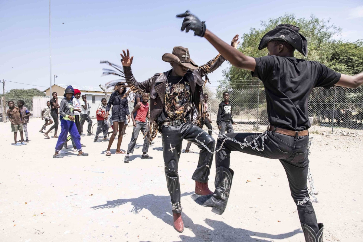Metal cowboys parade through village during Vulture Thrust Metal Fest in Botswana