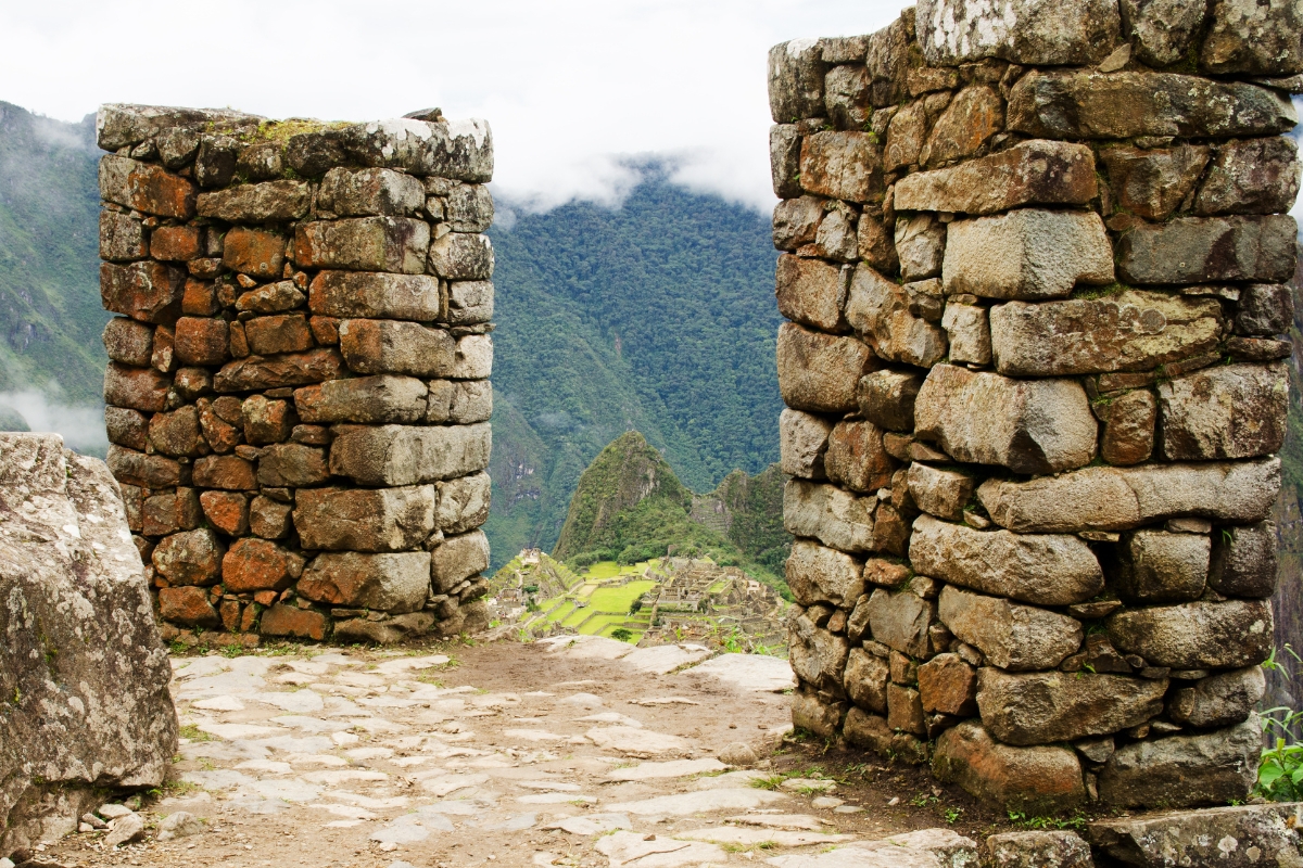 Stone walls of Sun Gate, Intipunku in Machu Picchu, Inca archaeological site in Peru