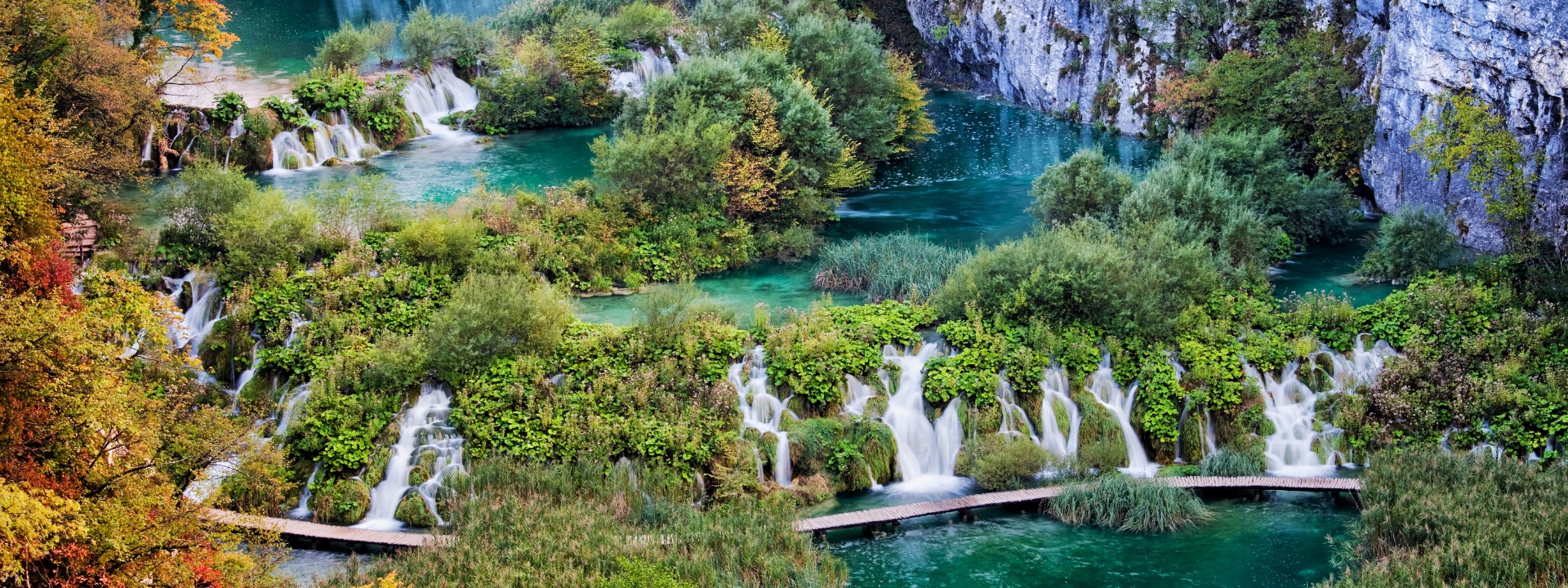 Waterfalls, emerald lakes, and walkway at Plitvice Lakes National Park, Croatia