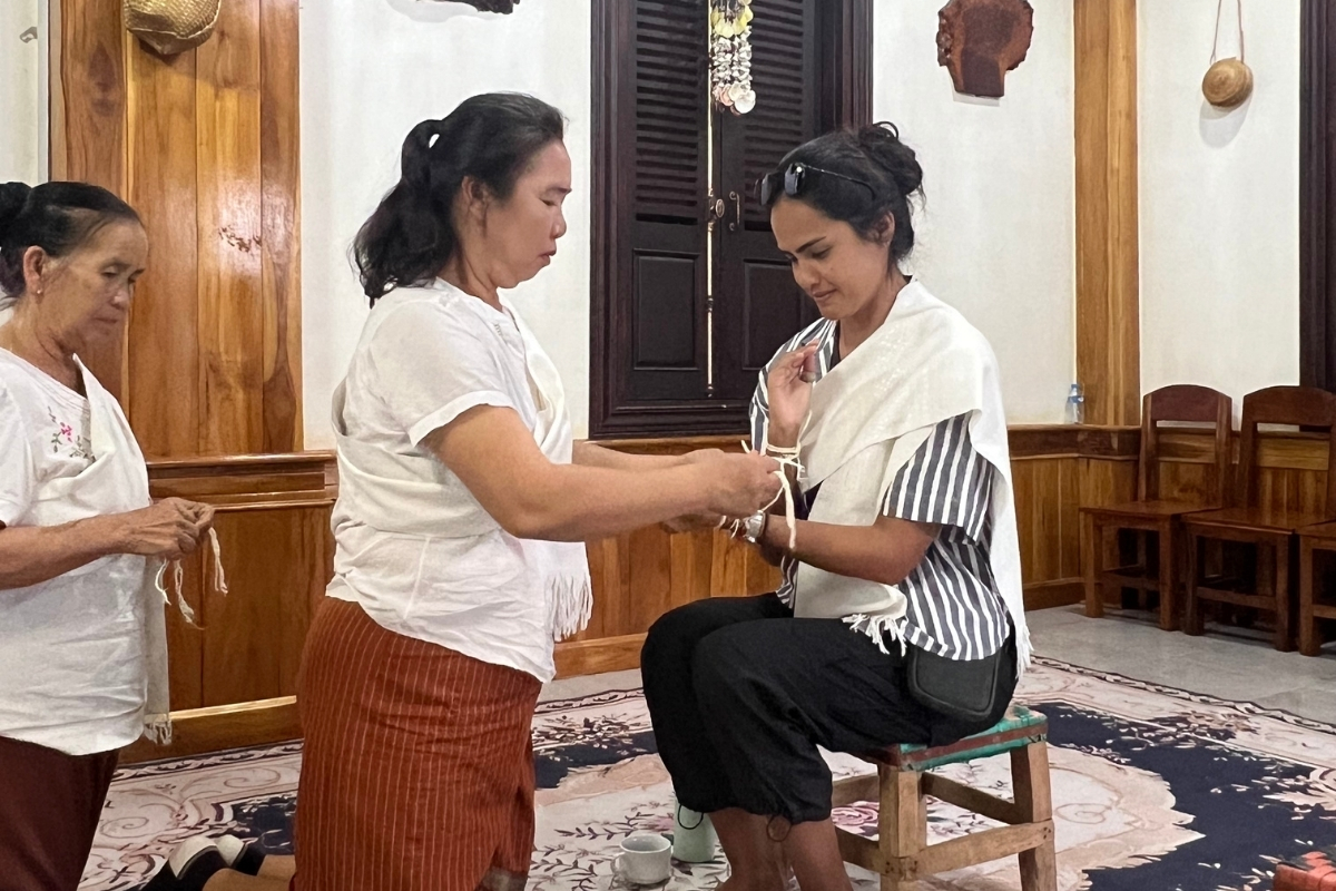 Claudia Cavero SA Expeditions traditional Baci Ceremony in Laos