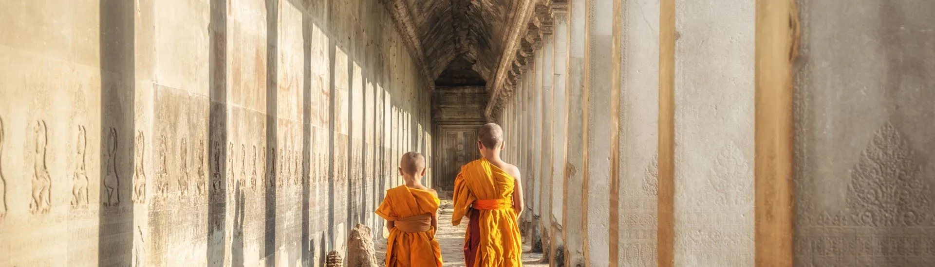 Siem Reap, Cambodia - Two monks walking in Angkor Wat temple