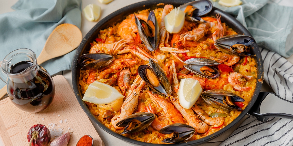 Seafood paella in a pan, Spanish food cuisine