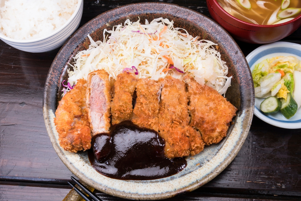 Nagoya’s beloved miso katsu pairs a crispy panko-breaded pork cutlet with a rich, savory-sweet miso sauce. 