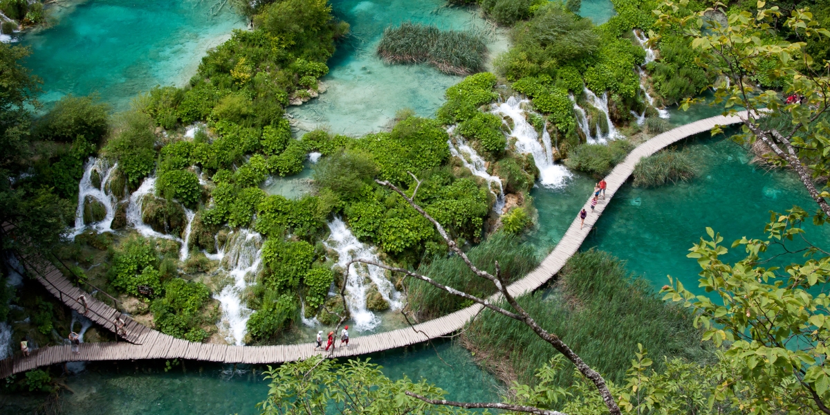 Walkways through waterfalls and lakes of Plitvice Lakes National Park, Croatia