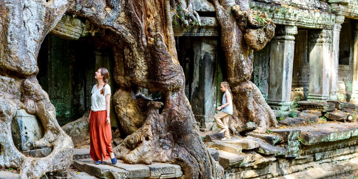 Tourists travelers walking around Angkor Wat temple in Cambodia