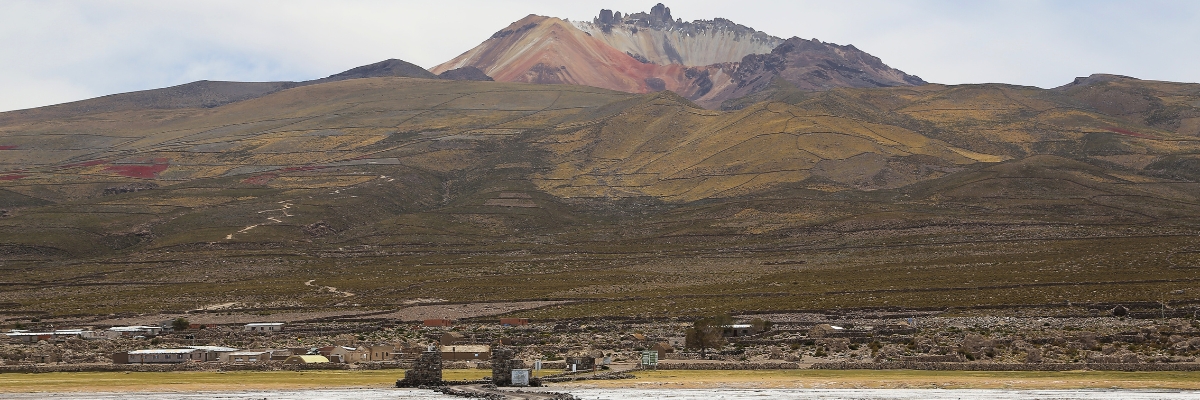 Coquesa Village at Salar de Uyuni with Tunupa Volcano in the background in Bolivia