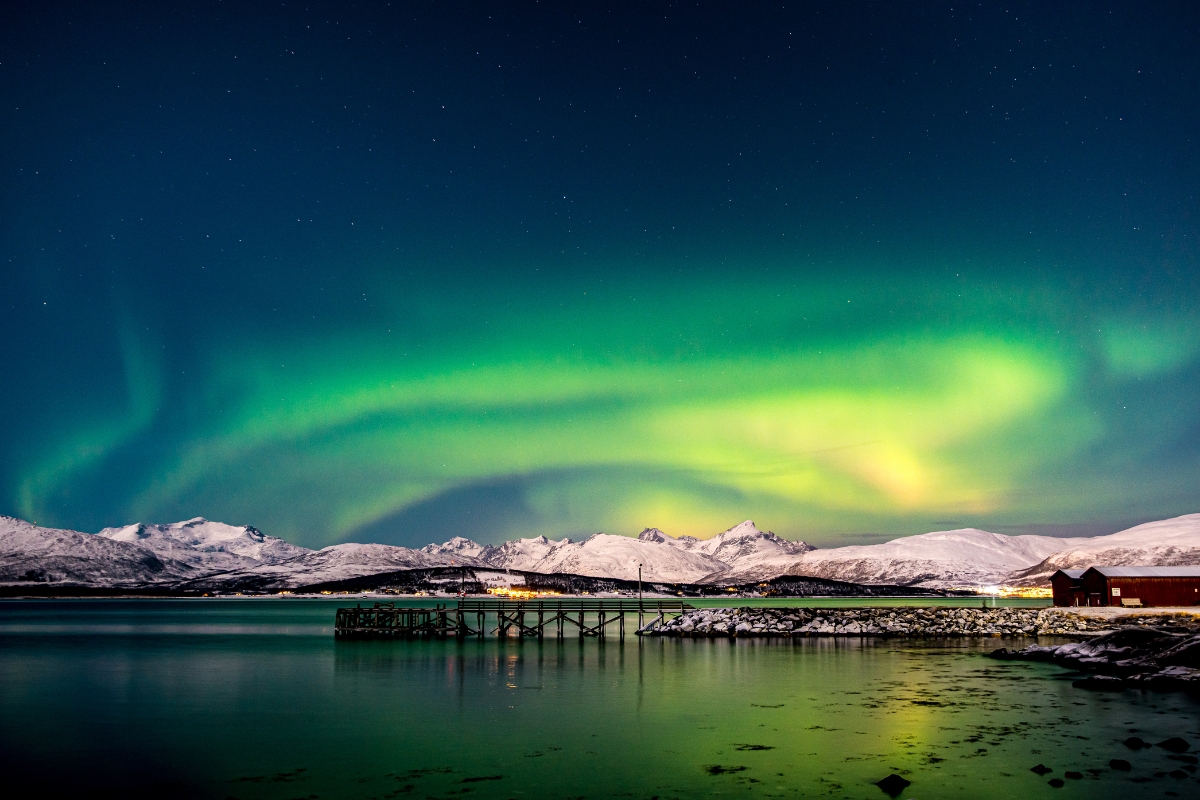 Northern lights or aurora borealis on the coast of Tromsø, Norway