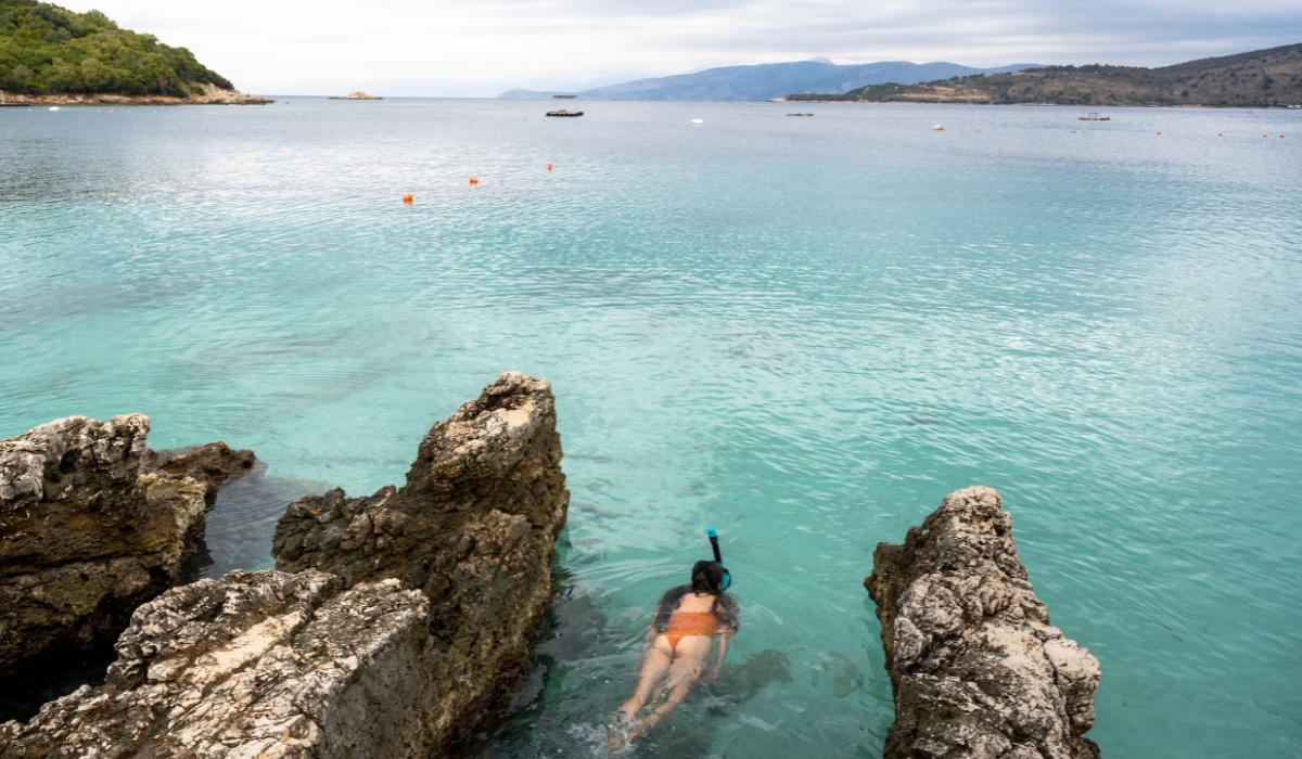 Woman swimming and snorkeling in the Adriatic Sea