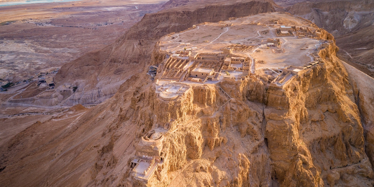 Aerial view of Masada ancient fortress in desert plateau in Israel