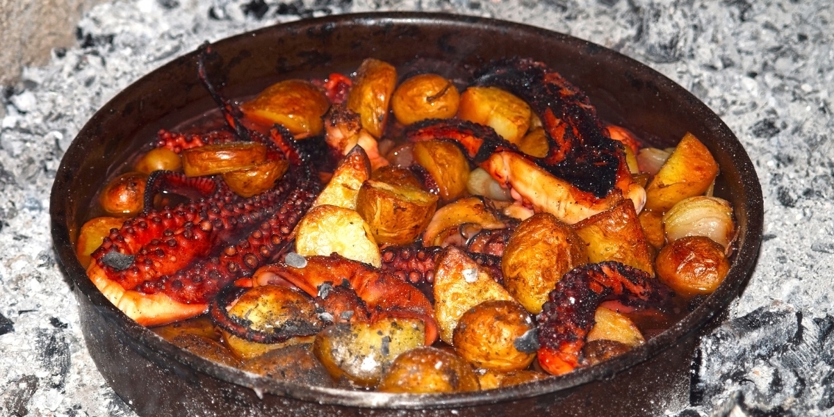 Peka cooked over hot oven coal in Croatia. Croatian food dish cuisine