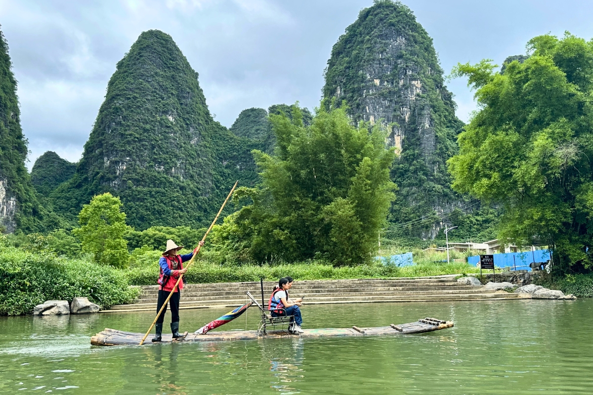 Floating down the Yulong River in Yangshuo, China
