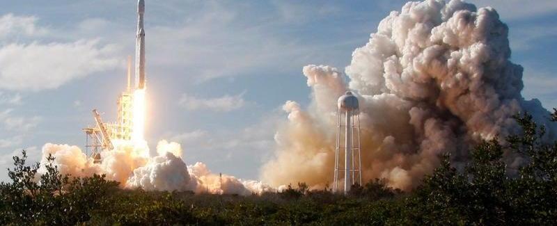 A SpaceX Falcon Heavy rocket lifts off from the Kennedy Space Center in Cape Canaveral