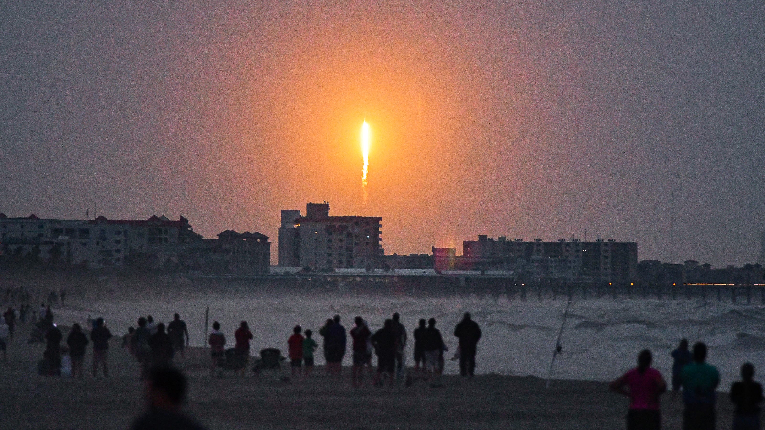 SpaceX Falcon 9 breaks through low clouds Monday on Starlink launch