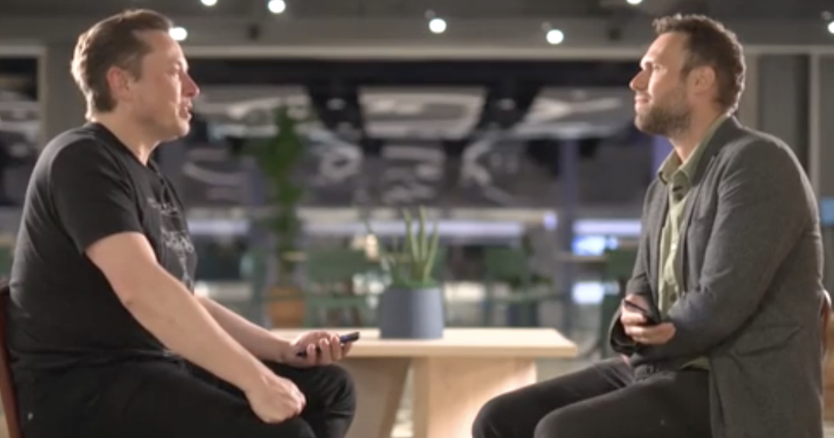 Elon Musk says he sleeps on a couch at Twitter headquarters and his dog is CEO in new wide-ranging interview