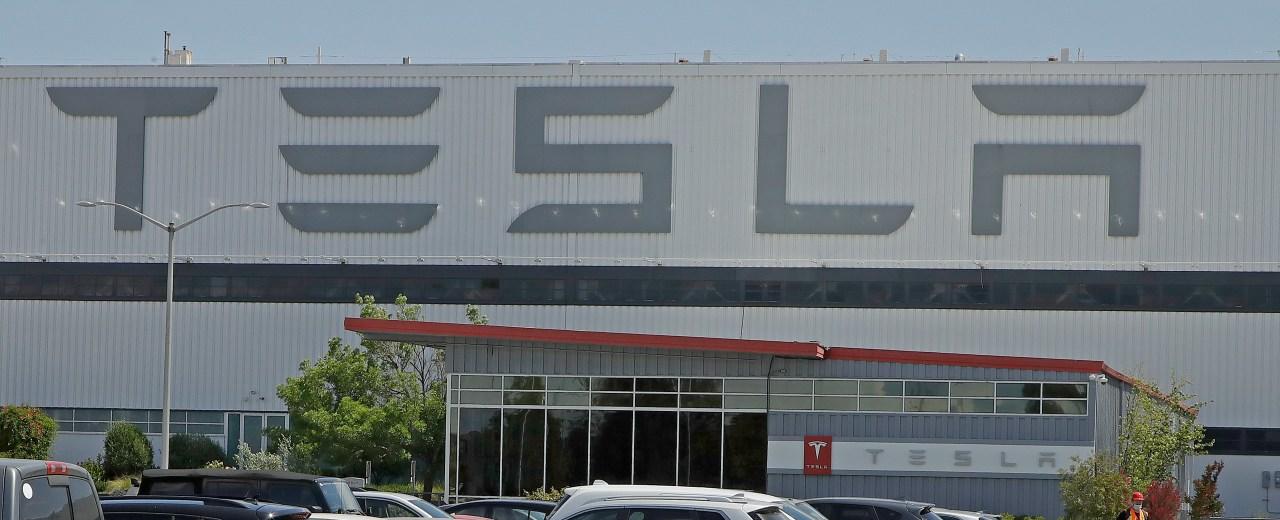 Tesla is raising factory worker pay as auto union tries to organize its electric vehicle plants