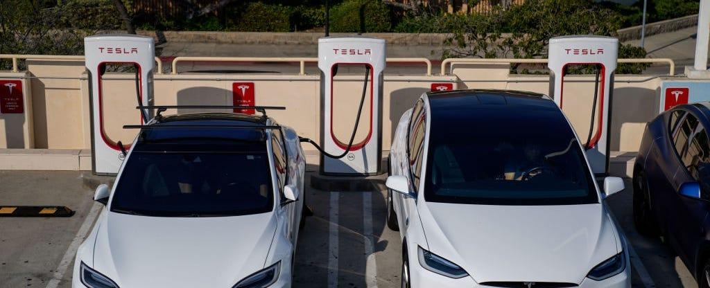 Tesla Owners Will Hate Waiting to Charge Behind Ford, GM Cars