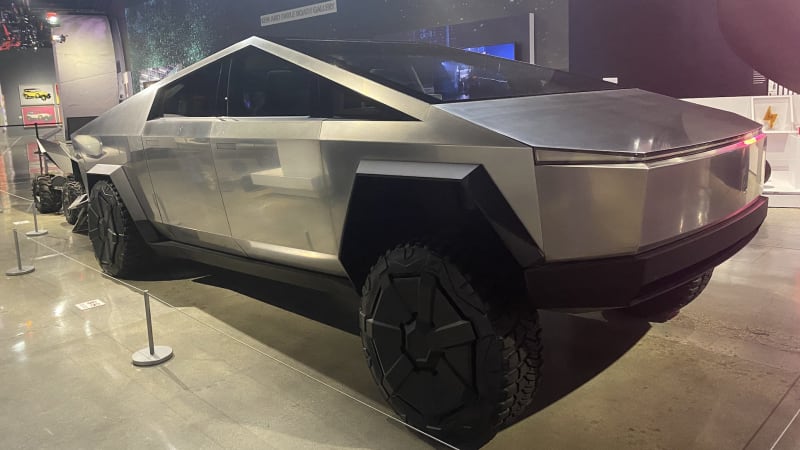 Tesla Cybertruck features, including 'vault' and no door handles, displayed - Autoblog