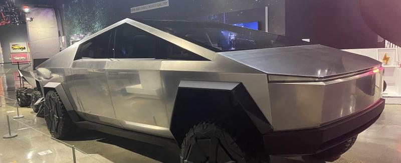 Tesla Cybertruck features, including 'vault' and no door handles, displayed - Autoblog