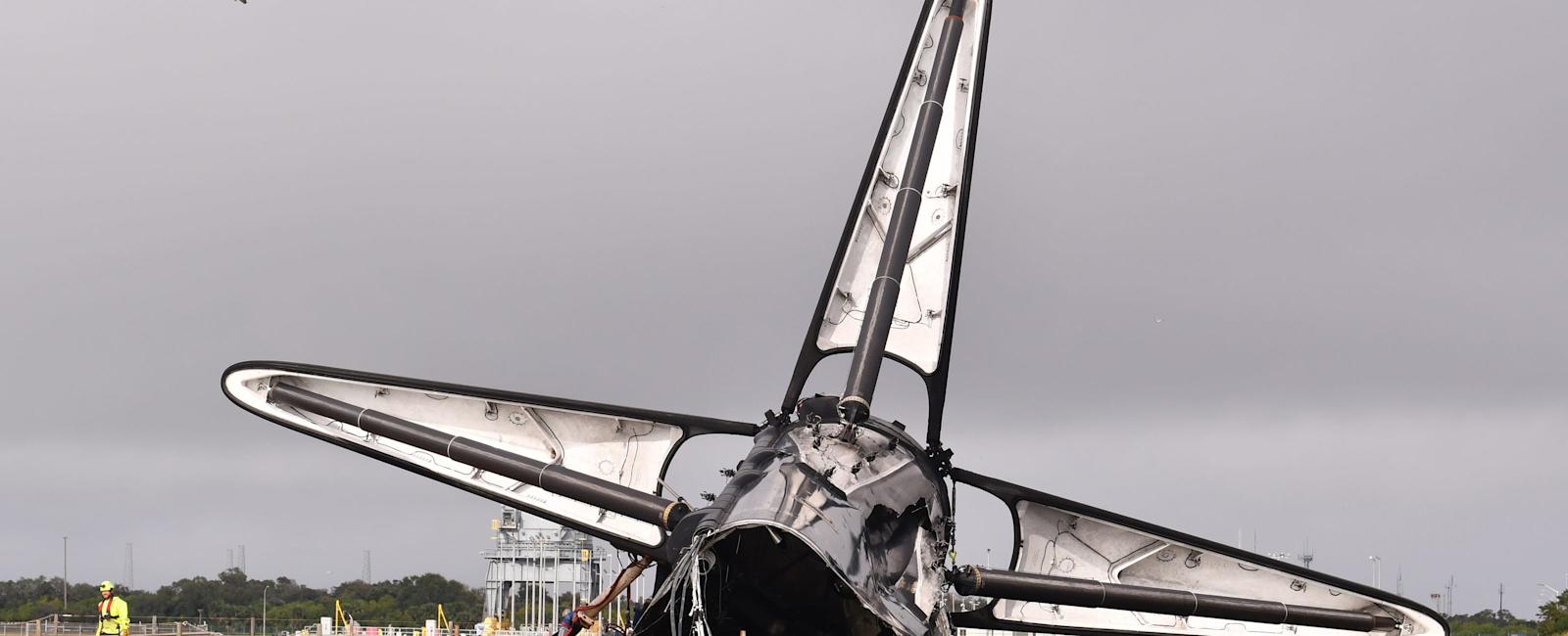 SpaceX Falcon 9 bashed up booster back at Florida cruise ship port