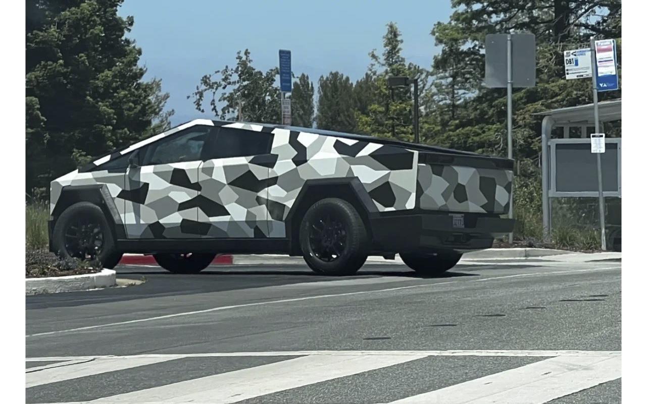 Finalised Tesla Cybertruck spotted sporting round steering wheel, camouflaged outfit